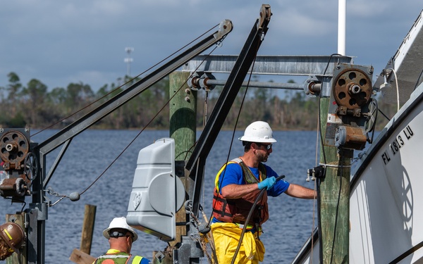 U.S. Coast Guard Begins Process Of Removing Damaged Boats