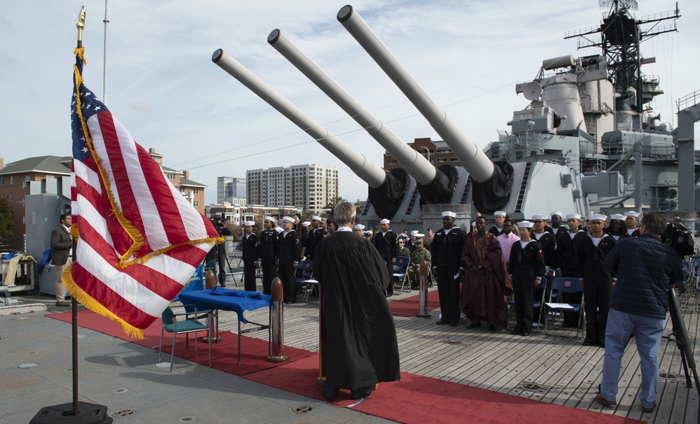 U.S. Sailors participate in naturalization ceremony aboard USS Wisconsin (BB-64)