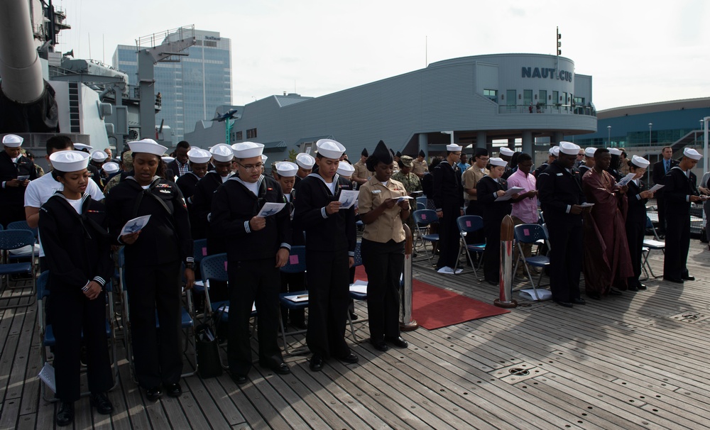 U.S. Sailors participate in naturalization ceremony aboard USS Wisconsin (BB-64)