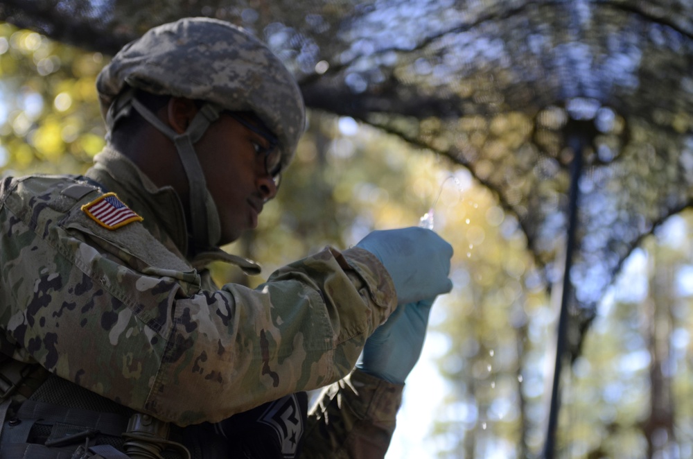 U.S. Army Soldiers take the Expert Field Medical Badge Qualification Exam