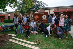 Fort Benning NCOA places PIE sign at local school