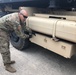 Army Trucks Carry Barriers To Southern Texas