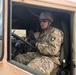 Army Trucks Carry Barriers To Southern Texas