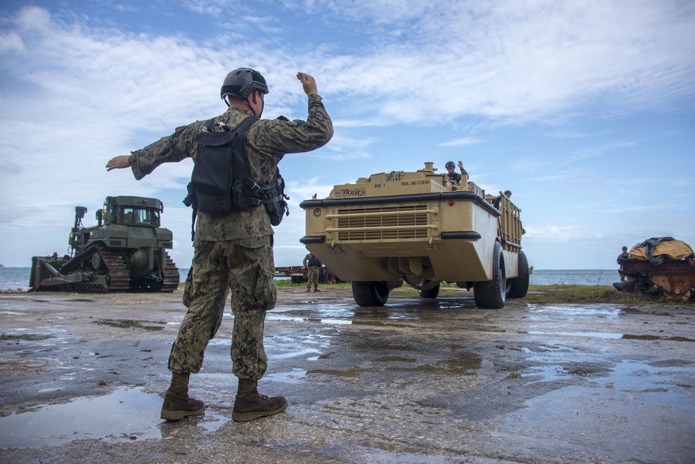 Military Transports Heavy Equipment Vehicles from to Saipan in Response to Super Typhoon Yutu