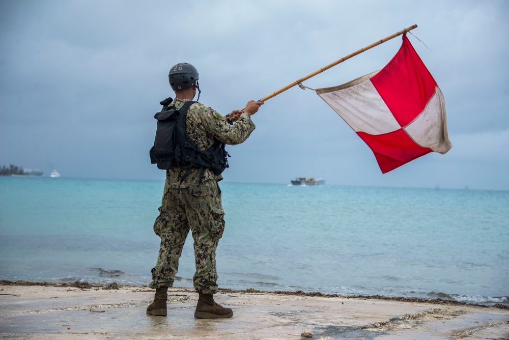 Military Transports Heavy Equipment Vehicles to Saipan in Response to Super Typhoon Yutu
