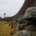 Soldiers Lay Barbed Wire At Gateway International Bridge