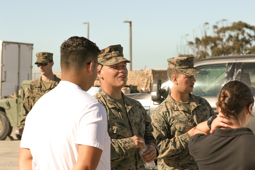 Marines Answer Questions from Custom and Border Protection Explorers