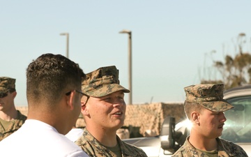 Marines interact with Young Men and Women from the Customs and Border Protection Explorer Program