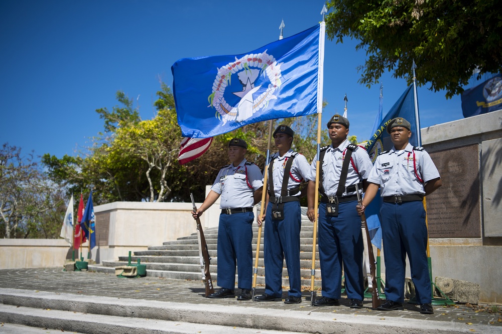 Yutu relief efforts pause to honor veterans