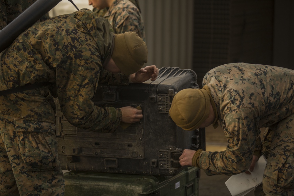 U.S. Marines clean gear after TJ18