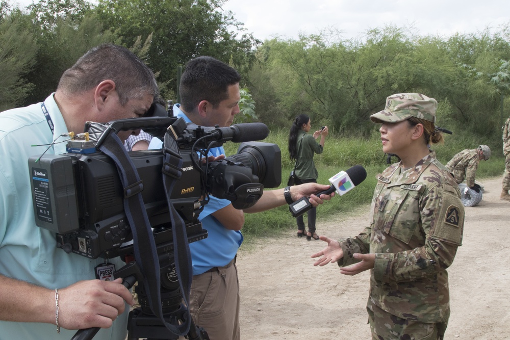 Soldier gives interview during civilian press event