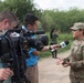 Soldier gives interview during civilian press event