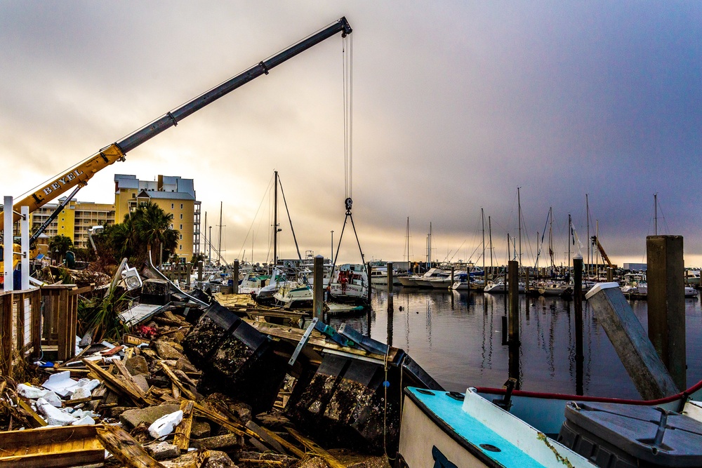 Damaged Boat Lifted from Marina