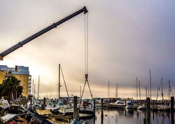 Damaged Boat Lifted from Marina