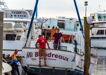 Damaged Boat Lifted from Marina