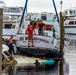 Damaged Boat Lifted from Marina