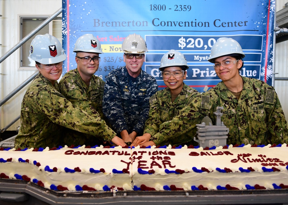 Nimitz CO Cuts Cake with Sailors