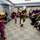 Lani's family dance hula in his honor