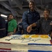Sailors Cut Cake For Veteran's Day