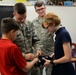 Airmen teach students proper flag procedures