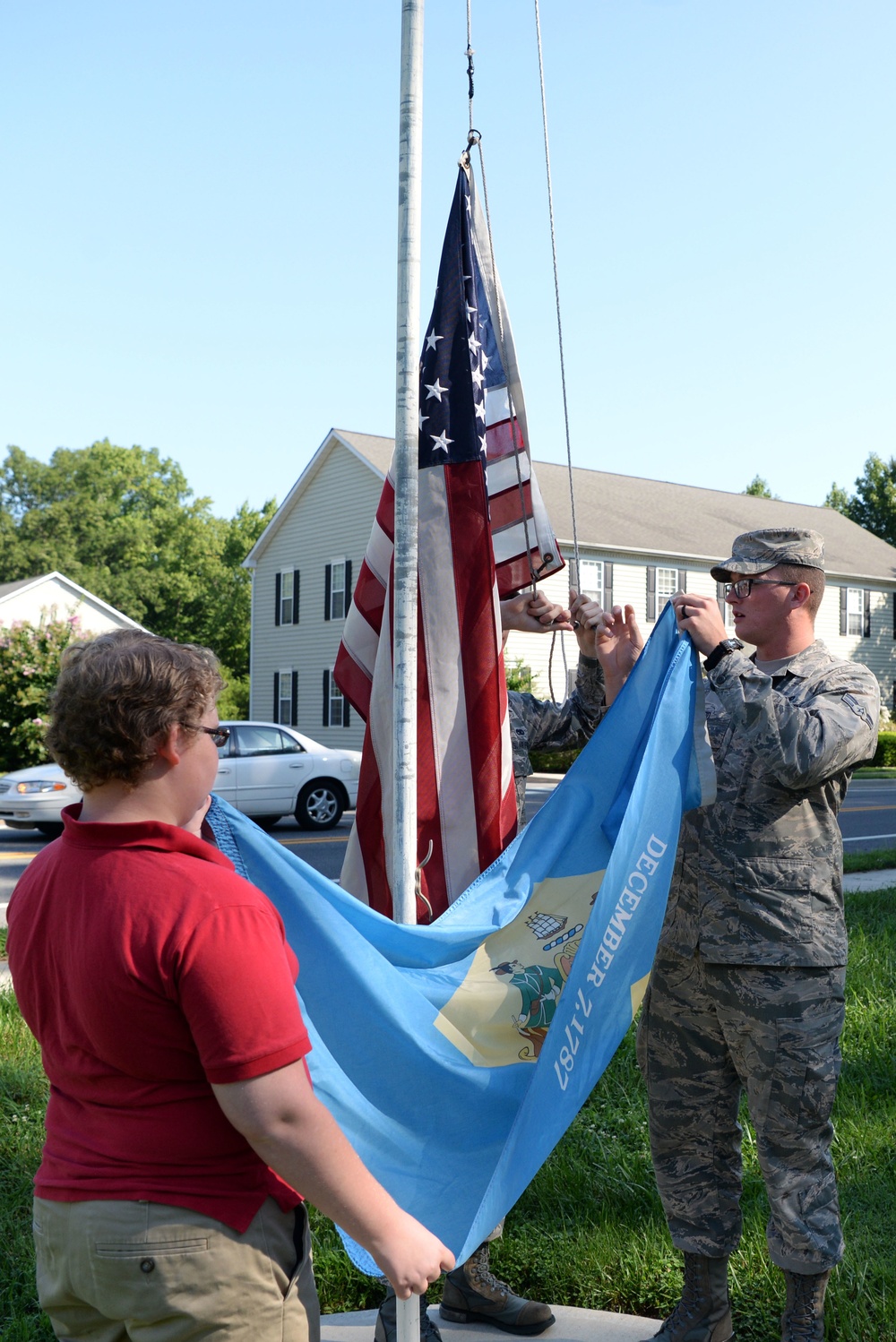 Airmen teach students proper flag procedures