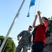 Airmen teach students proper flag procadures