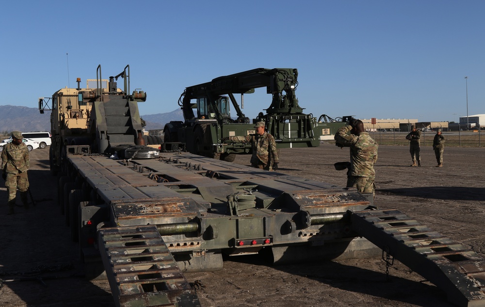 Soldiers from 264th CSSB and 1st Armored Cavalry Division load RTCH for movement to the Southwest border