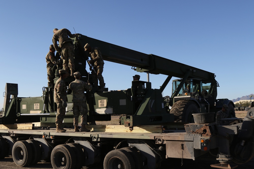 Soldiers from 264th CSSB and 1st Armored Cavalry Division load RTCH for movement to the Southwest border