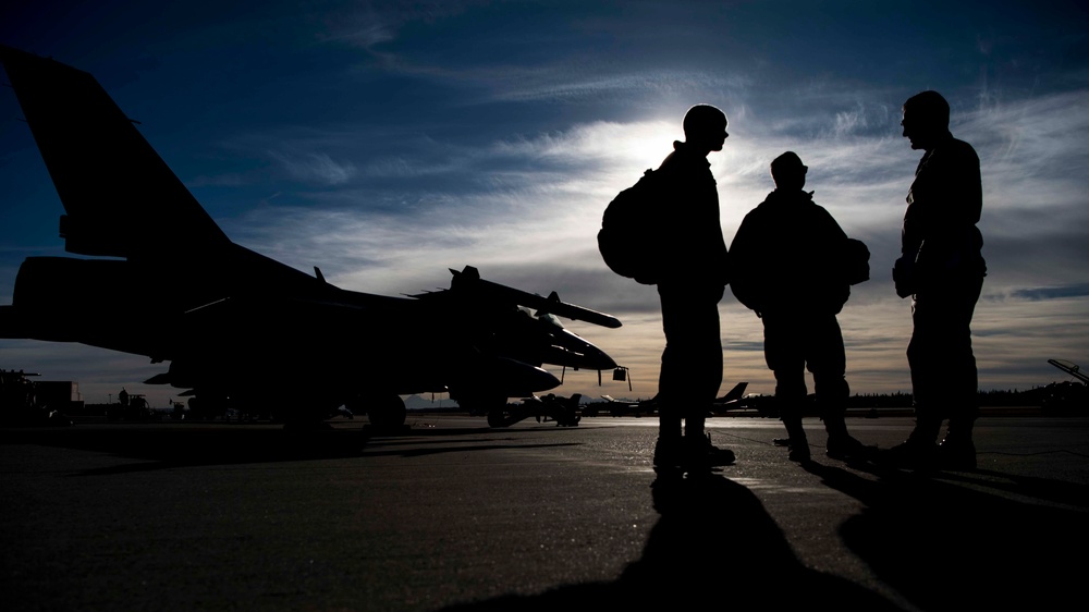 Three Airmen and their jet