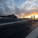 Sailors standby during an engine test on an MH-60S Knight Hawk, with Helicopter Sea Combat Squadron (HSC) 14, on the flight deck aboard the Nimitz-class aircraft carrier USS John C. Stennis (CVN 74).