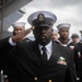 Chief Religious Program Specialist John Dillard, from Montgomery, Alabama salutes during a burial-at-sea aboard the Nimitz-class aircraft carrier USS John C. Stennis (CVN 74).