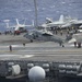 An MH-60S Knight Hawk, with Helicopter Sea Combat Squadron (HSC) 14, approaches the flight deck of the Nimitz-class aircraft carrier USS John C. Stennis (CVN 74).