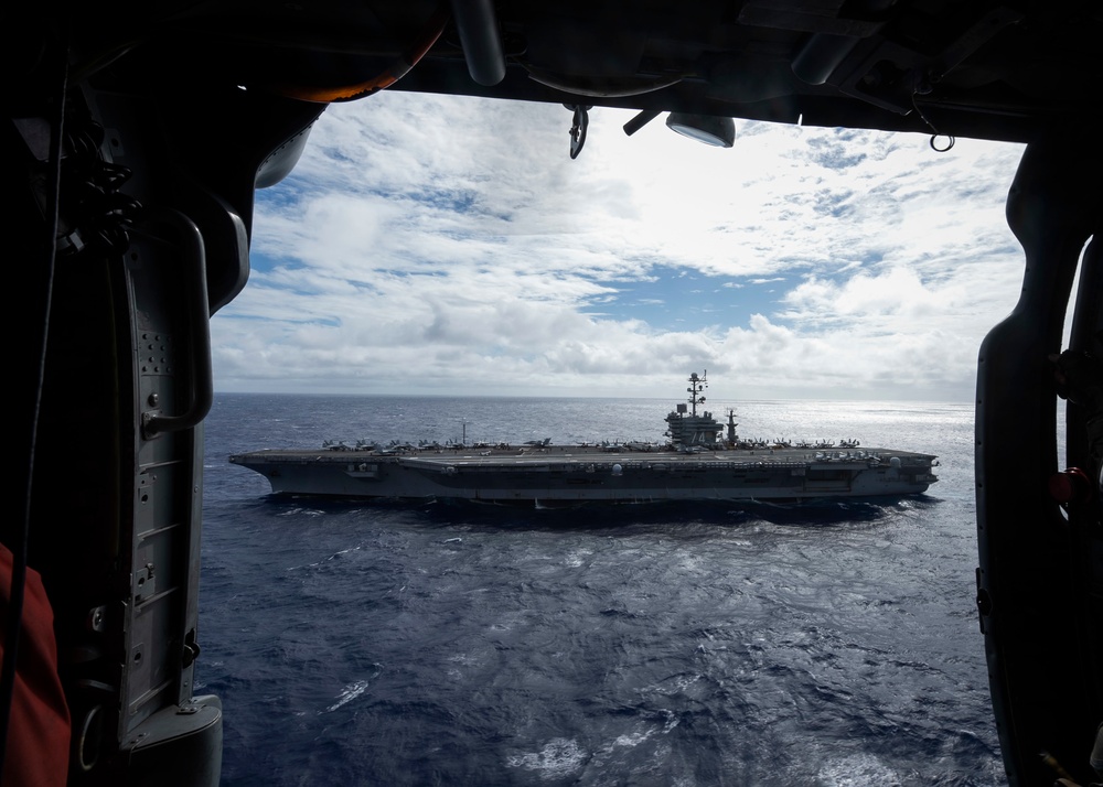 The Nimitz-class aircraft carrier USS John C. Stennis (CVN 74) steams through the Pacific Ocean.