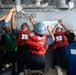 Sailors secure a line during a refueling-at-sea aboard the Nimitz-class aircraft carrier USS John C. Stennis (CVN 74).