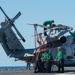 Sailors secure rotors on an MH-60R Sea Hawk, with Helicopter Maritime Strike Squadron (HSM) 71, on the flight deck aboard the Nimitz-class aircraft carrier USS John C. Stennis (CVN 74).