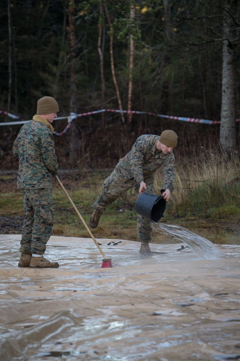 8th ESB Marines Wash Equipment Prior to Storage