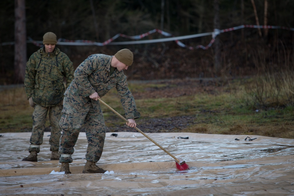 8th ESB Marines Wash Equipment Prior to Storage