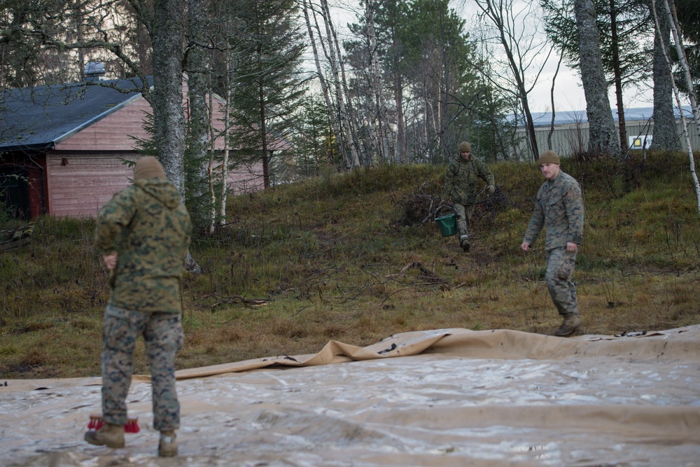 8th ESB Marines Wash Equipment Prior to Storage