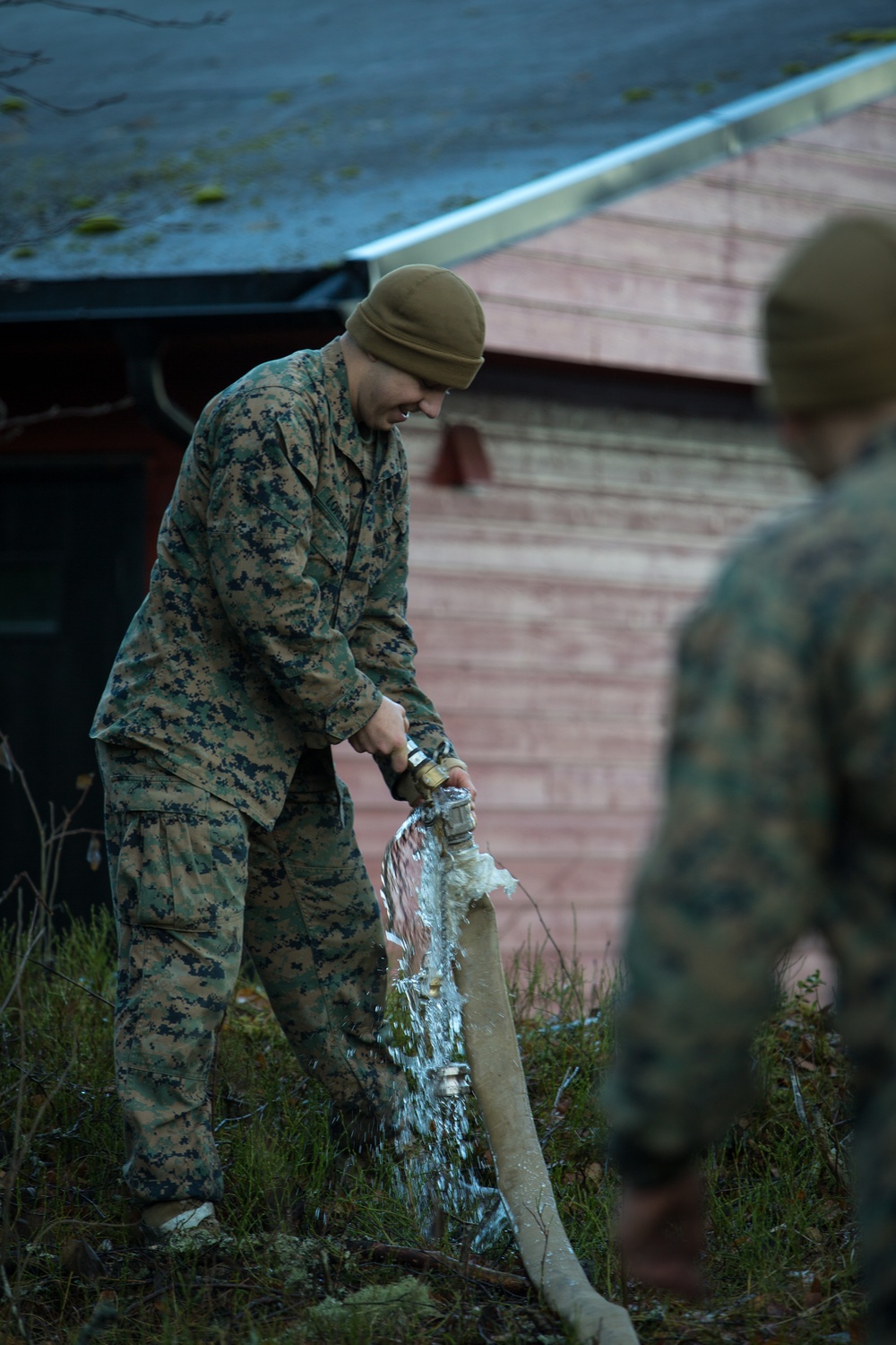 8th ESB Marines Wash Equipment Prior to Storage