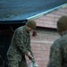 8th ESB Marines Wash Equipment Prior to Storage