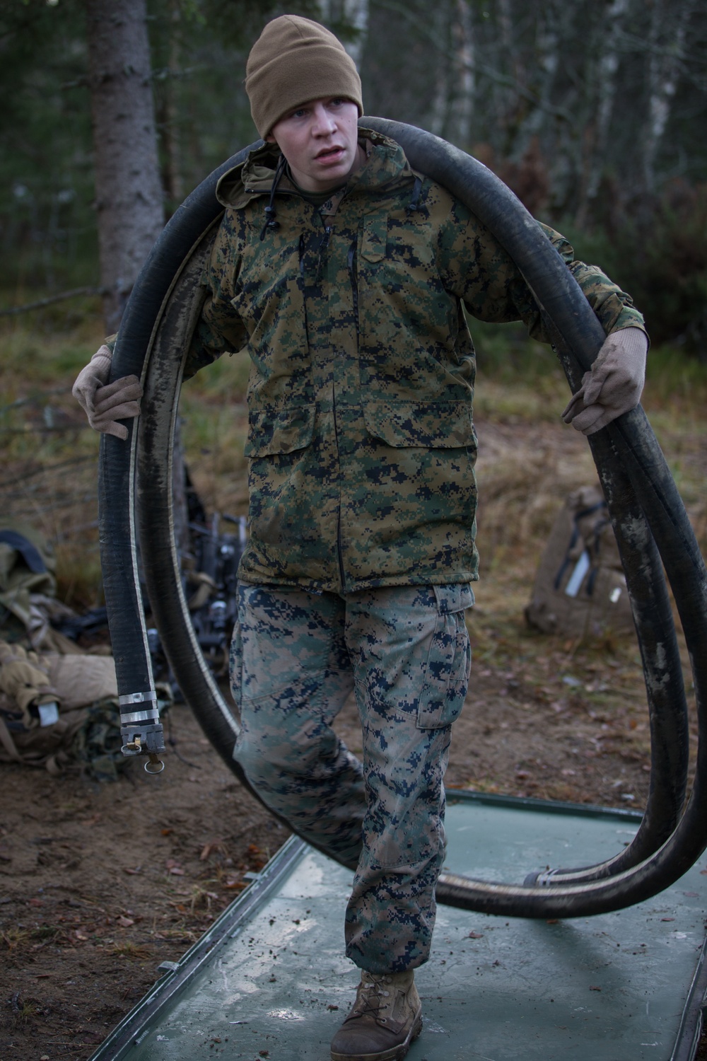 8th ESB Marines Wash Equipment Prior to Storage