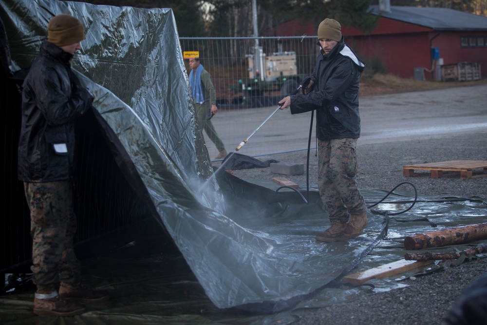 8th ESB Marines Wash Equipment Prior to Storage