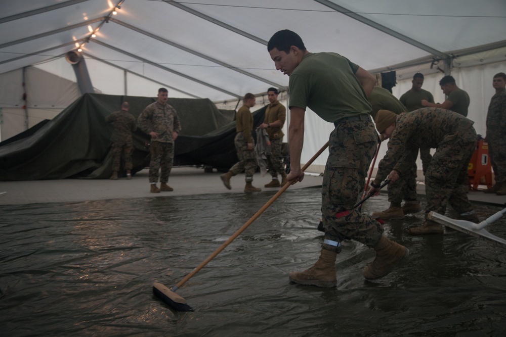 8th ESB Marines Wash Equipment Prior to Storage