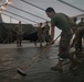 8th ESB Marines Wash Equipment Prior to Storage