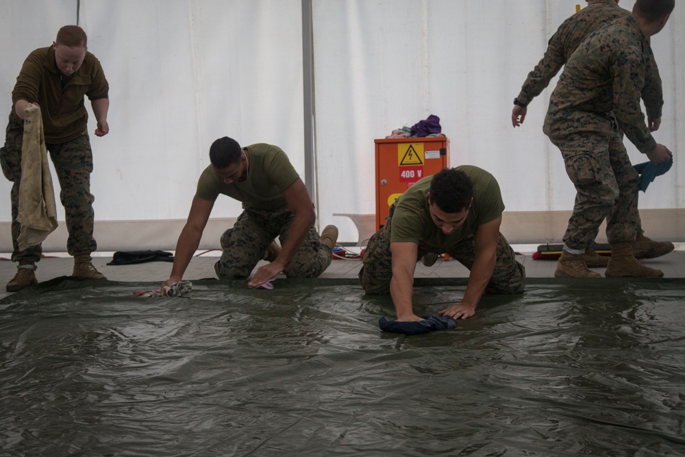 8th ESB Marines Wash Equipment Prior to Storage