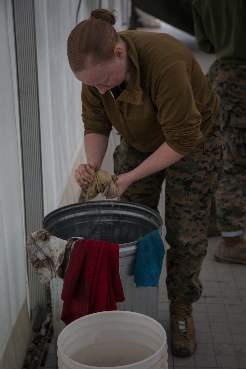 8th ESB Marines Wash Equipment Prior to Storage