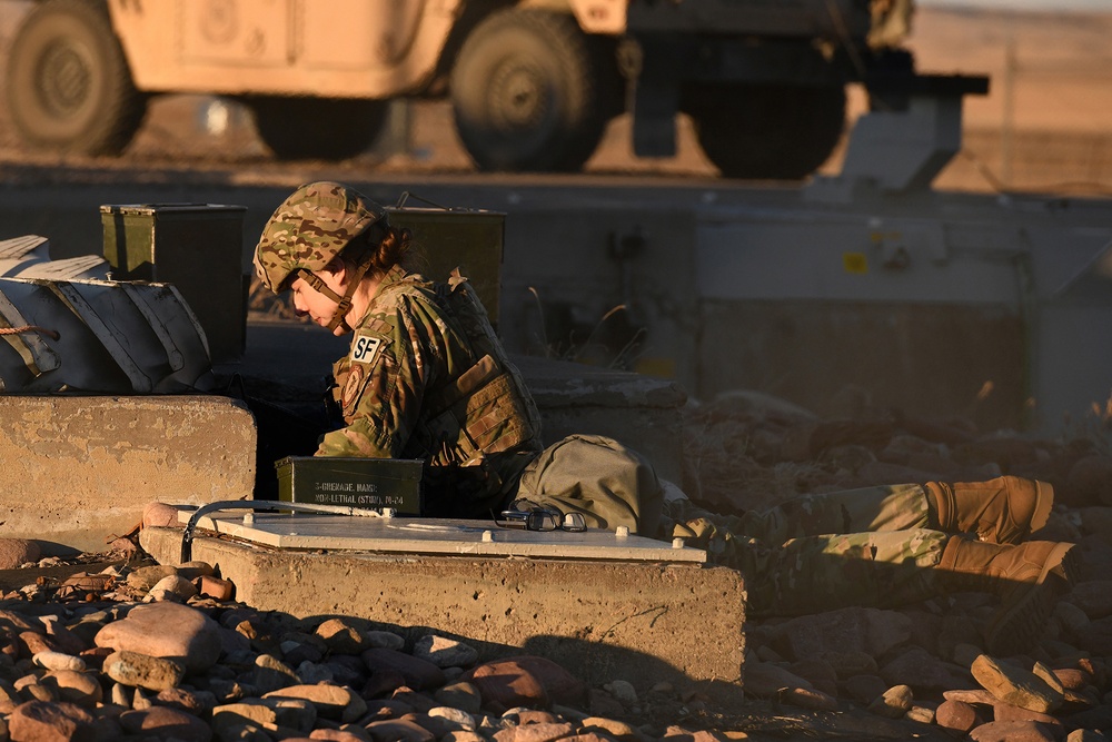 A member of the 341st Security Forces Group assists in a facility recapture during exercise during Global Thunder 19, Oct. 30, 2018, at Malmstrom Air Force Base, Mont.