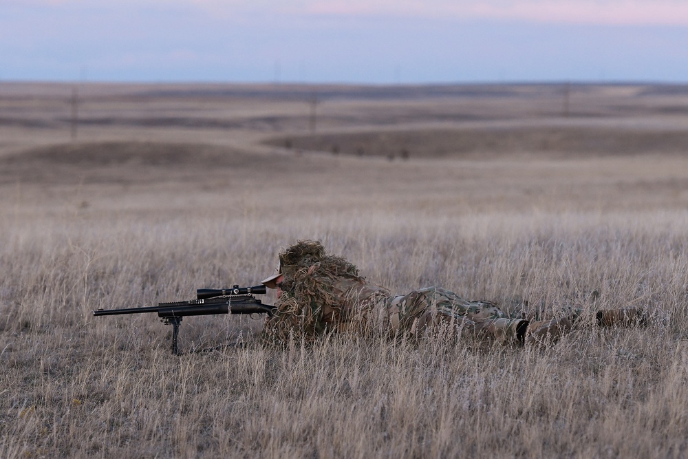 A nuclear advanced designated marksman from the 341st Security Support Squadron Tactical Response Force assists in a launch facility recapture exercise from a distance in support of Global Thunder 19, Oct. 30, 2018