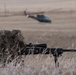 A nuclear advanced designated marksman from the 341st Security Support Squadron Tactical Response Force watches as a helicopter offloads other members in support of a launch facility recapture exercise during Global Thunder 19, Oct. 30, 2018