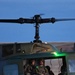 Members of the 341st Security Forces Group prepare to load a helicopter assigned to the 40th Helicopter Squadron during a launch facility recapture exercise during Global Thunder 19, Oct. 30, 2018, at Malmstrom Air Force Base, Mont.